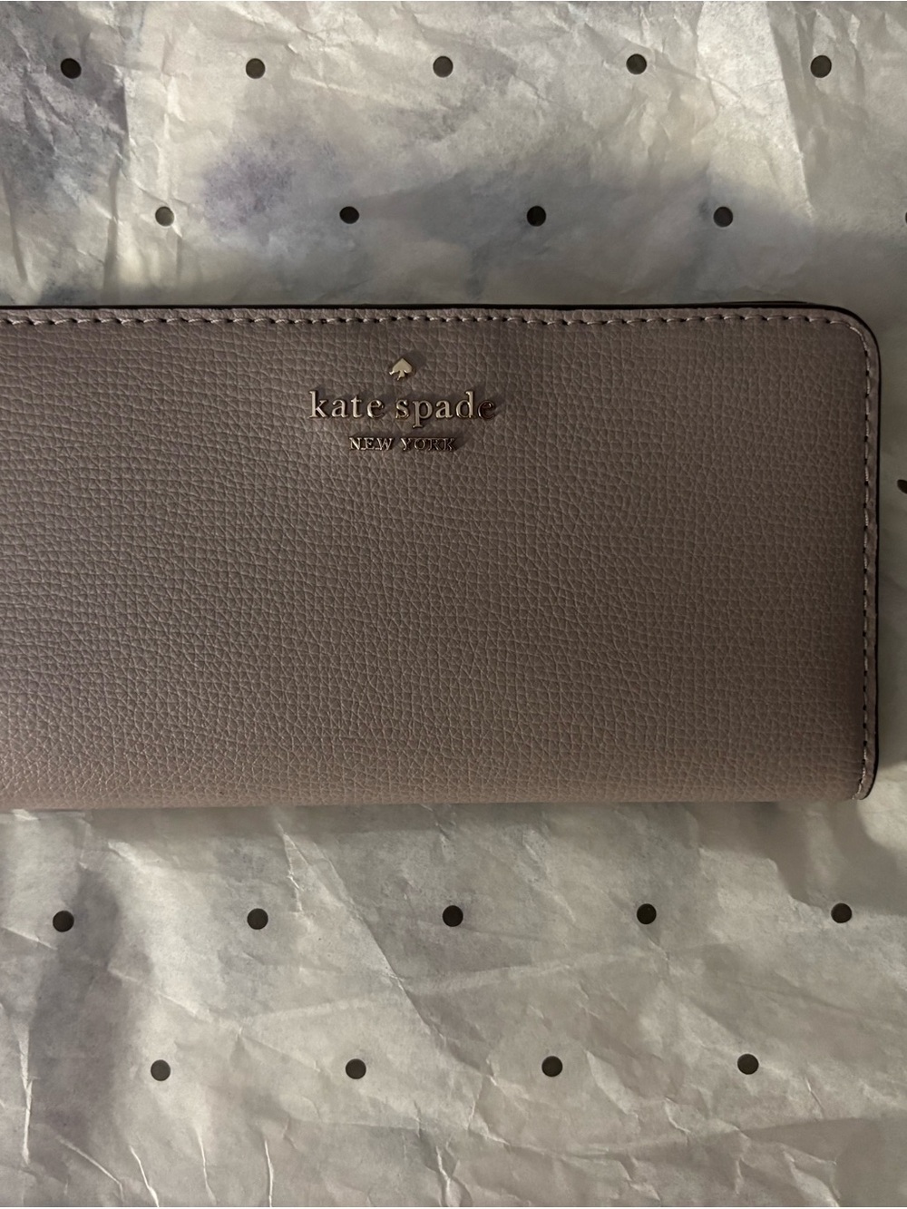 kate spade pebble leather zip-around wallet in dusty mauve